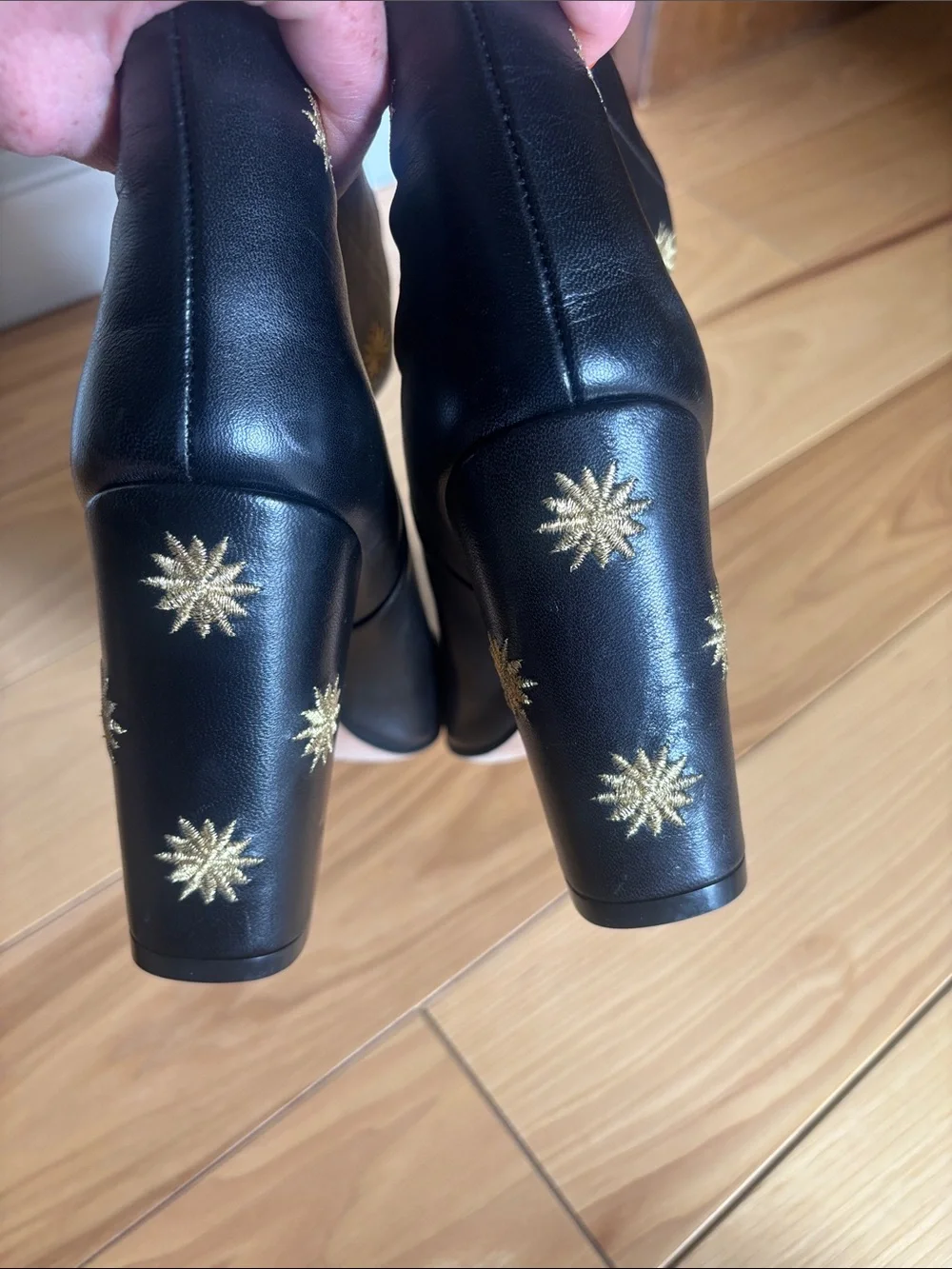 Stuart Weitzman Black Over-the-Knee Boots with Gold Star Studs